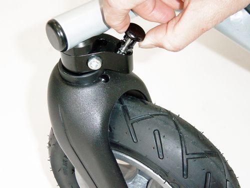 Locking wheel rotation for BINGO wheelchair