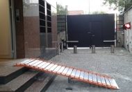 Roll up wheelchair ramps on stairs